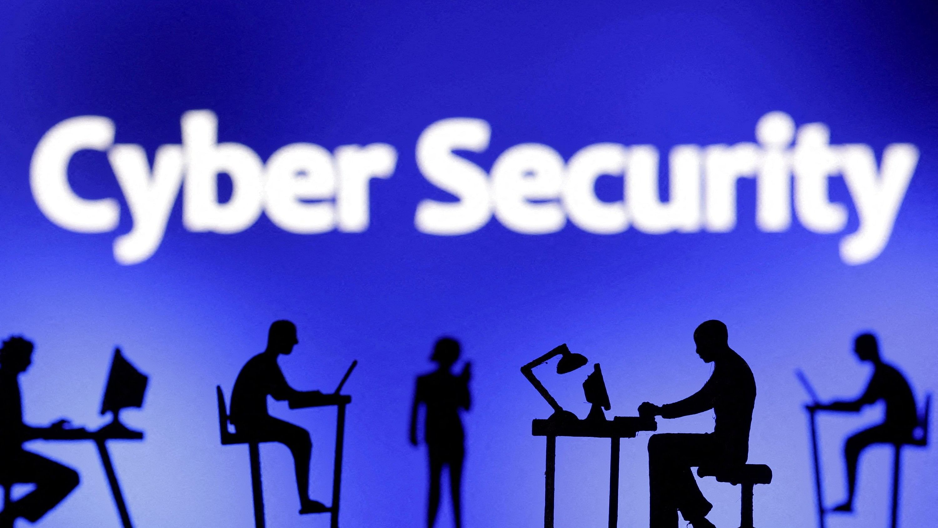 <div class="paragraphs"><p> Figurines with computers and smartphones are seen in front of the words "Cyber Security" in this illustration.&nbsp;</p></div>