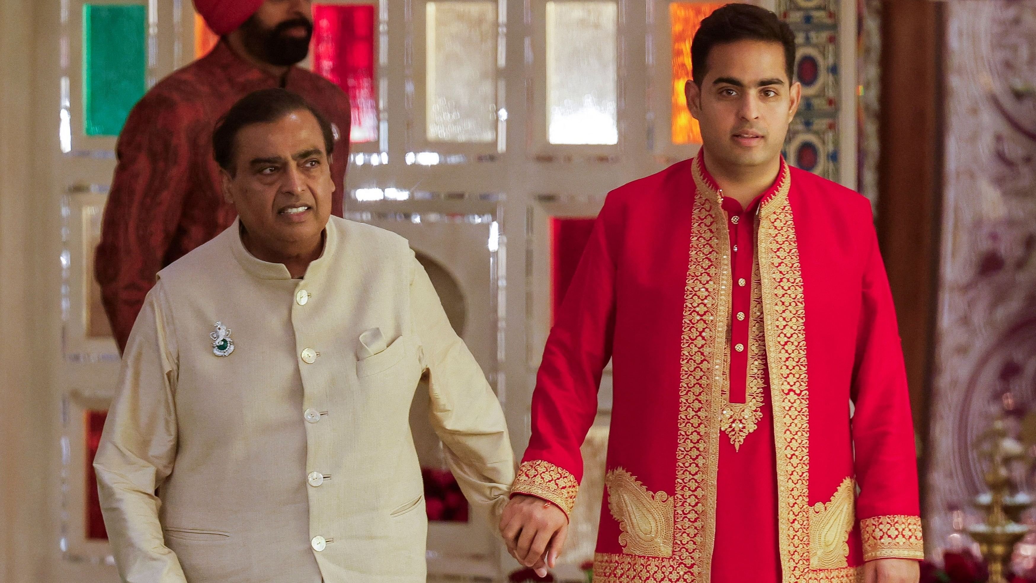 <div class="paragraphs"><p> Mukesh Ambani  with his son Akash Ambani.</p></div>