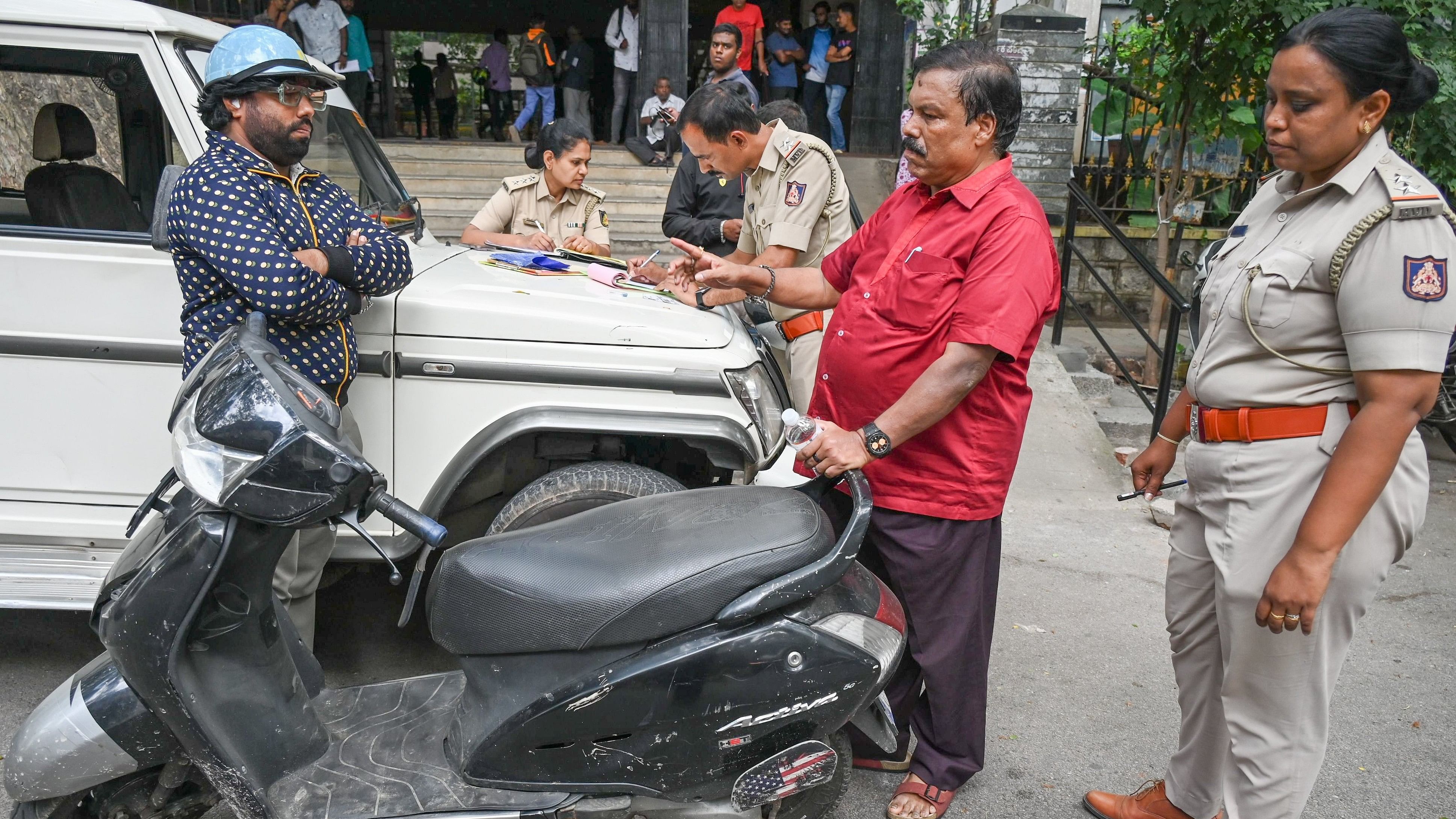 <div class="paragraphs"><p>Transport Department officials inspect seized vehicles at the Regional Transport Office, Rajajinagar, on Friday.&nbsp;</p></div>