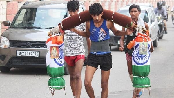 <div class="paragraphs"><p>Kanwariyas on their way to fetch water from Ganga River, ahead of the holy month of 'Shravan', in Meerut, Uttar Pradesh.</p></div>