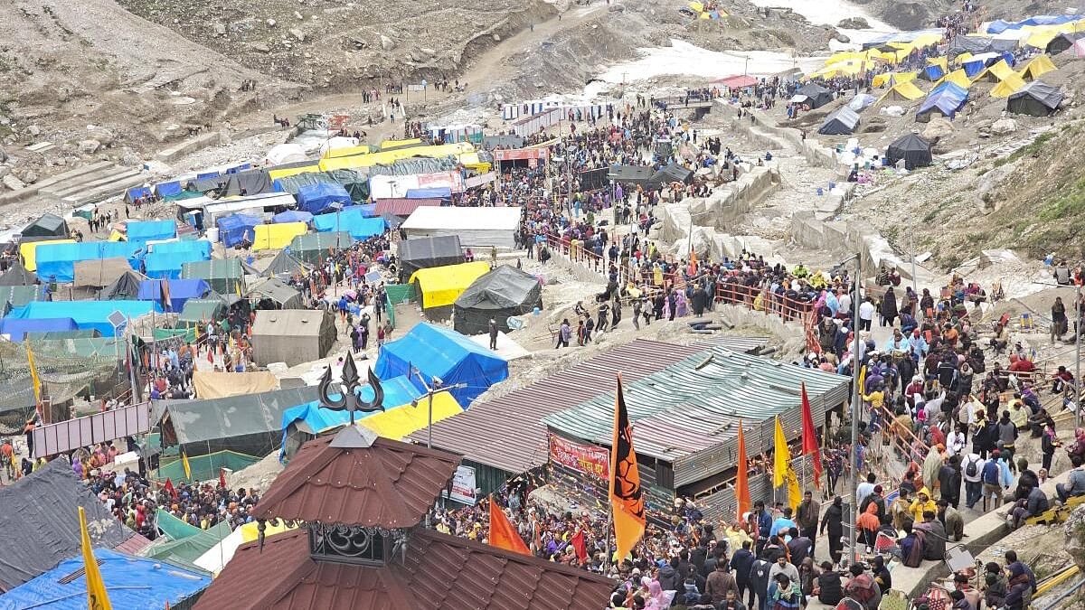 <div class="paragraphs"><p>Devotees arrive at the Amarnath Temple to offer prayers during the annual ‘Amarnath Yatra’.</p></div>