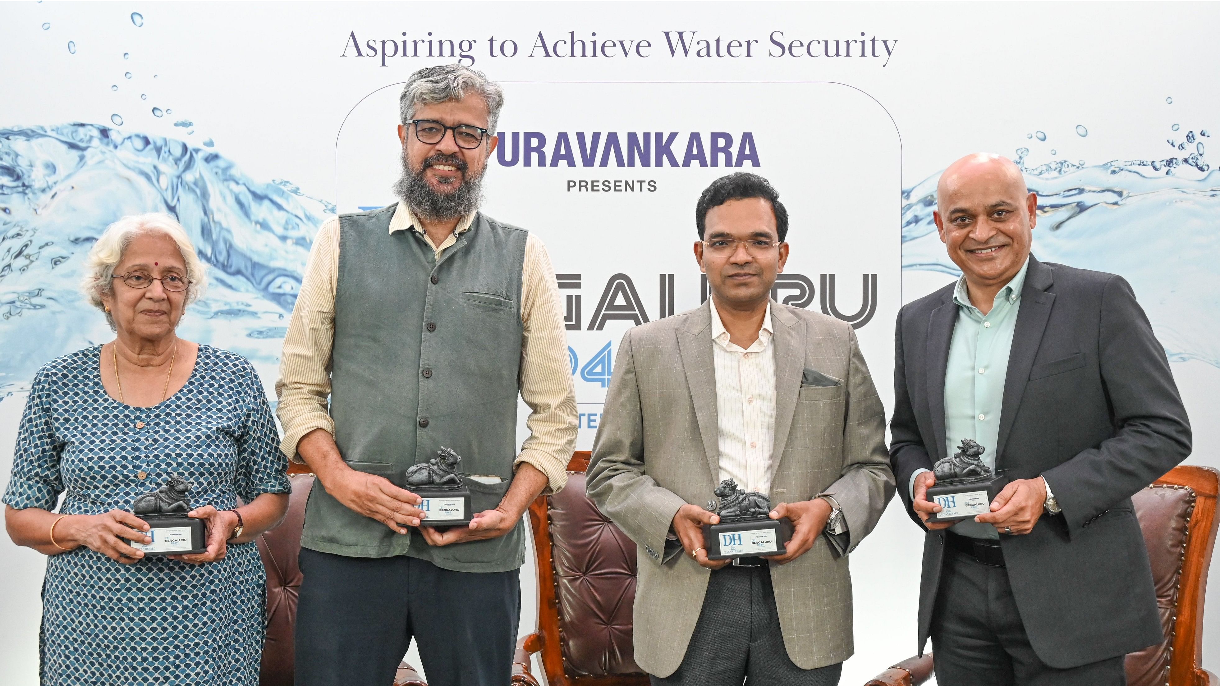 <div class="paragraphs"><p>Lake conservationist Usha Rajagopalan, rainwater harvesting pioneer S Vishwanath,&nbsp;BWSSB chairman Ramprasat Manohar V, and&nbsp;Mallanna Sasalu, CEO, Provident Housing Ltd, a wholly owned subsidiary of Puravankara, at the 'DH Bengaluru Water Summit' at the TPML office premises on MG Road on Friday. </p></div>