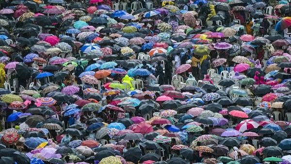 <div class="paragraphs"><p>People use umbrellas to shield themselves during monsoon rains, in Mumbai, Thursday, July 11.</p></div>