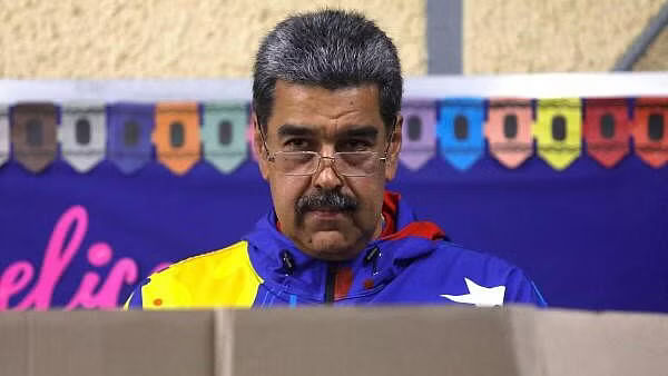 <div class="paragraphs"><p>Venezuelan President Nicolas Maduro looks on as he votes during presidential election in Caracas, Venezuela. </p></div>