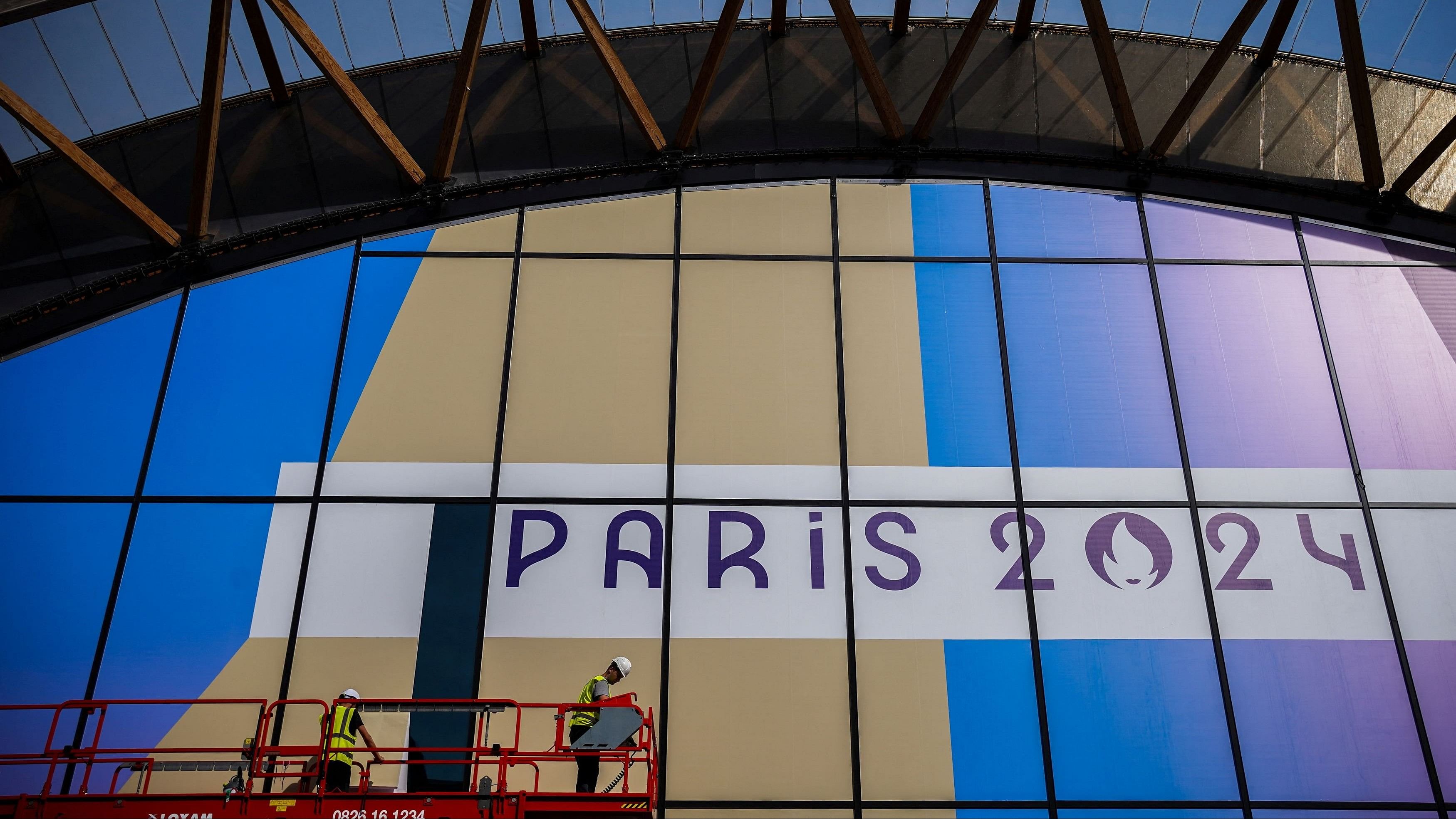 <div class="paragraphs"><p>Workers work outside of Arena Champs de Mars ahead the Paris 2024 Olympic and Paralympic Games in Paris, France.</p></div>