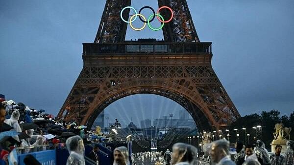 <div class="paragraphs"><p>Delegations arrive at the Trocadero during the opening ceremony of the Paris 2024 Olympic Games in Paris on July 26, 2024 with the Eiffel Tower in the background. </p></div>