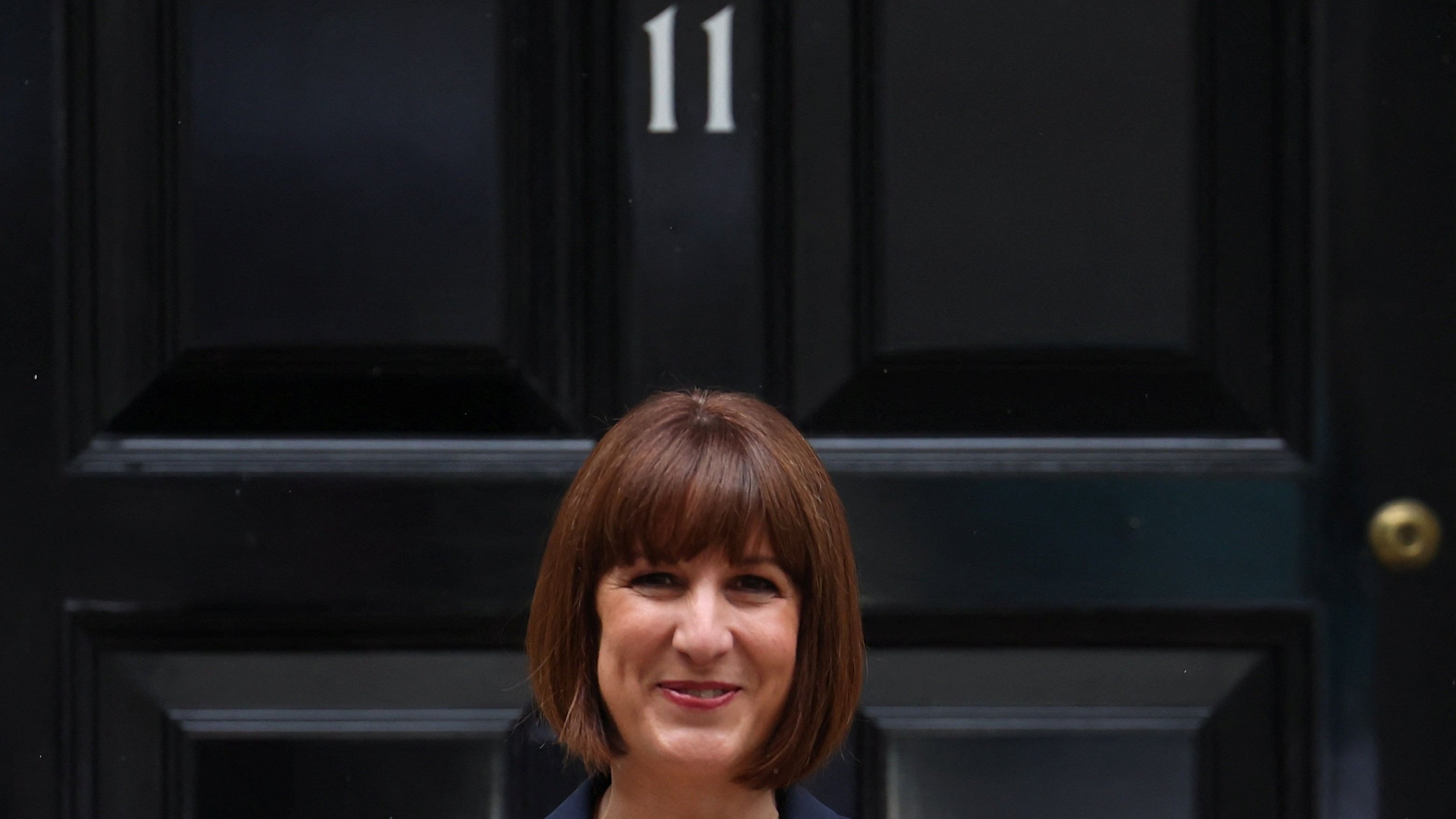 <div class="paragraphs"><p>Newly appointed Chancellor of the Exchequer Rachel Reeves poses outside 11 Downing Street, following the results of the election, in London, Britain, July 5, 2024.</p></div>