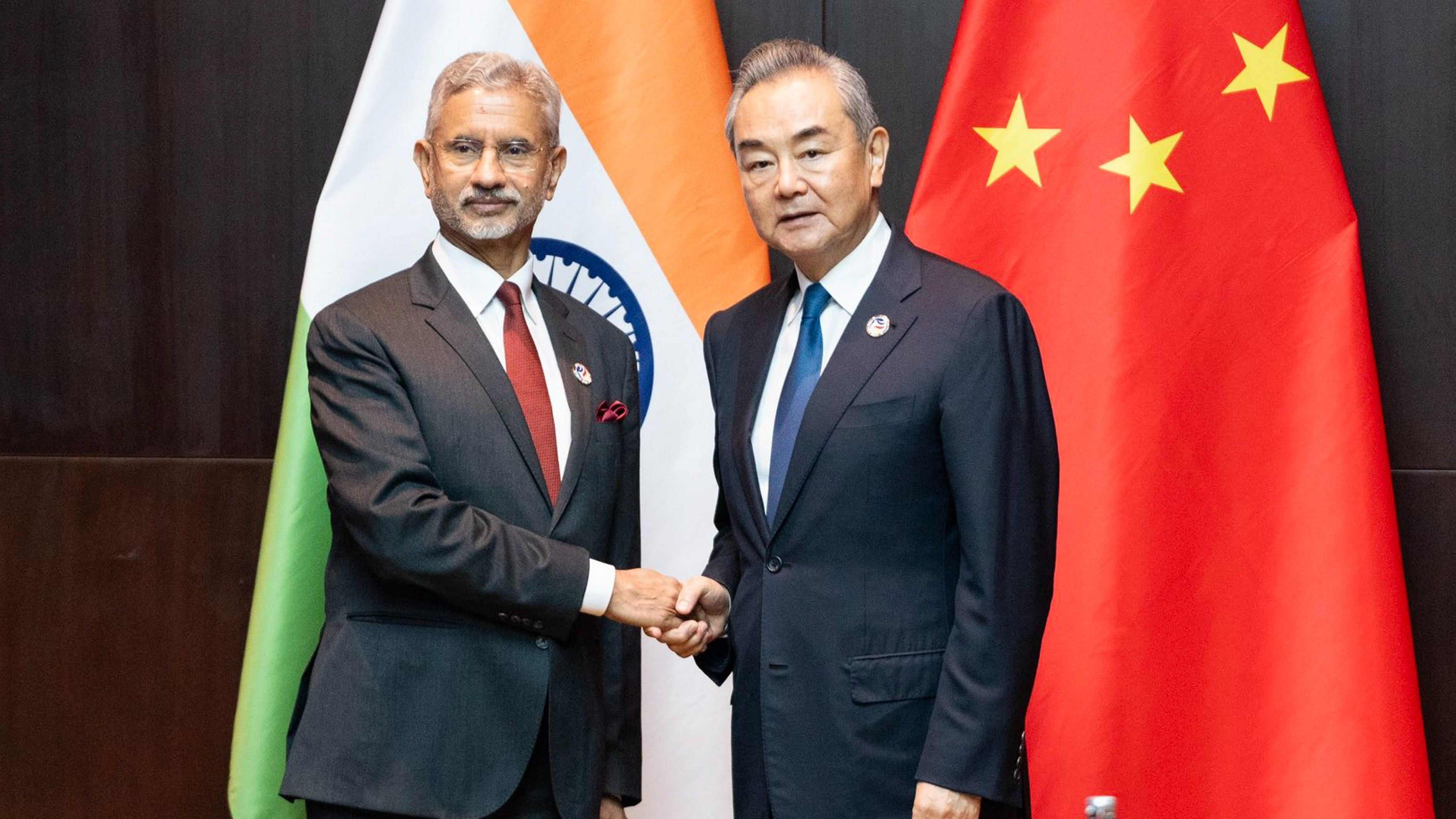 <div class="paragraphs"><p>Minister of External Affairs S. Jaishankar with Foreign Minister of China Wang Yi during a meeting on the sidelines of ASEAN meetings, in Vientiane, Thursday.</p></div>