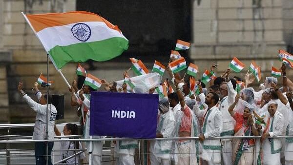 <div class="paragraphs"><p>Athletes of India aboard a boat in the floating parade on the river Seine during the opening ceremony on July 27, 2024.</p></div>