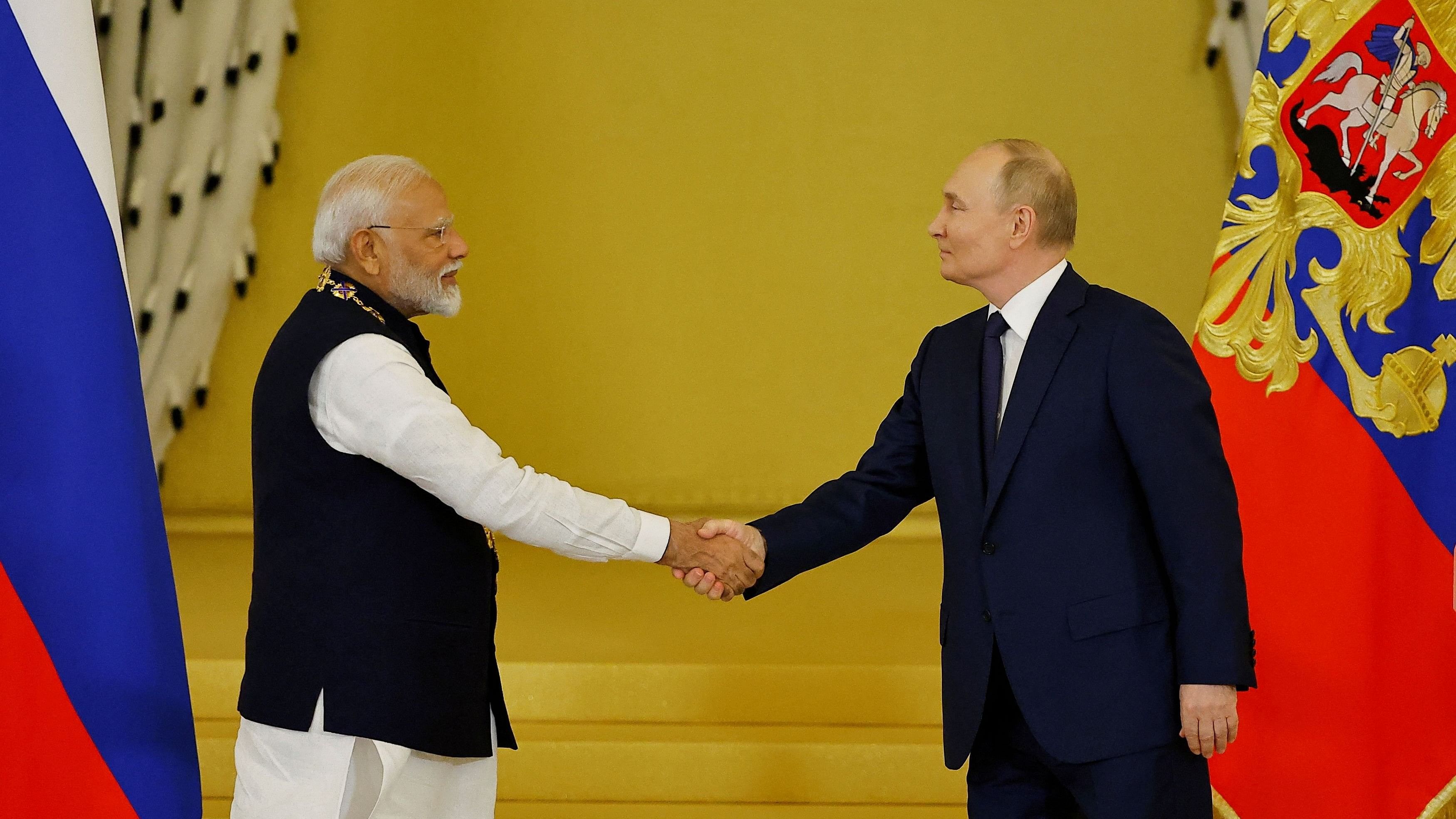 <div class="paragraphs"><p>Russia's President Vladimir Putin awards India's Prime Minister Narendra Modi with the Order of St. Andrew the Apostle the First-Called at the Kremlin in Moscow, Russia July 9, 2024. </p></div>