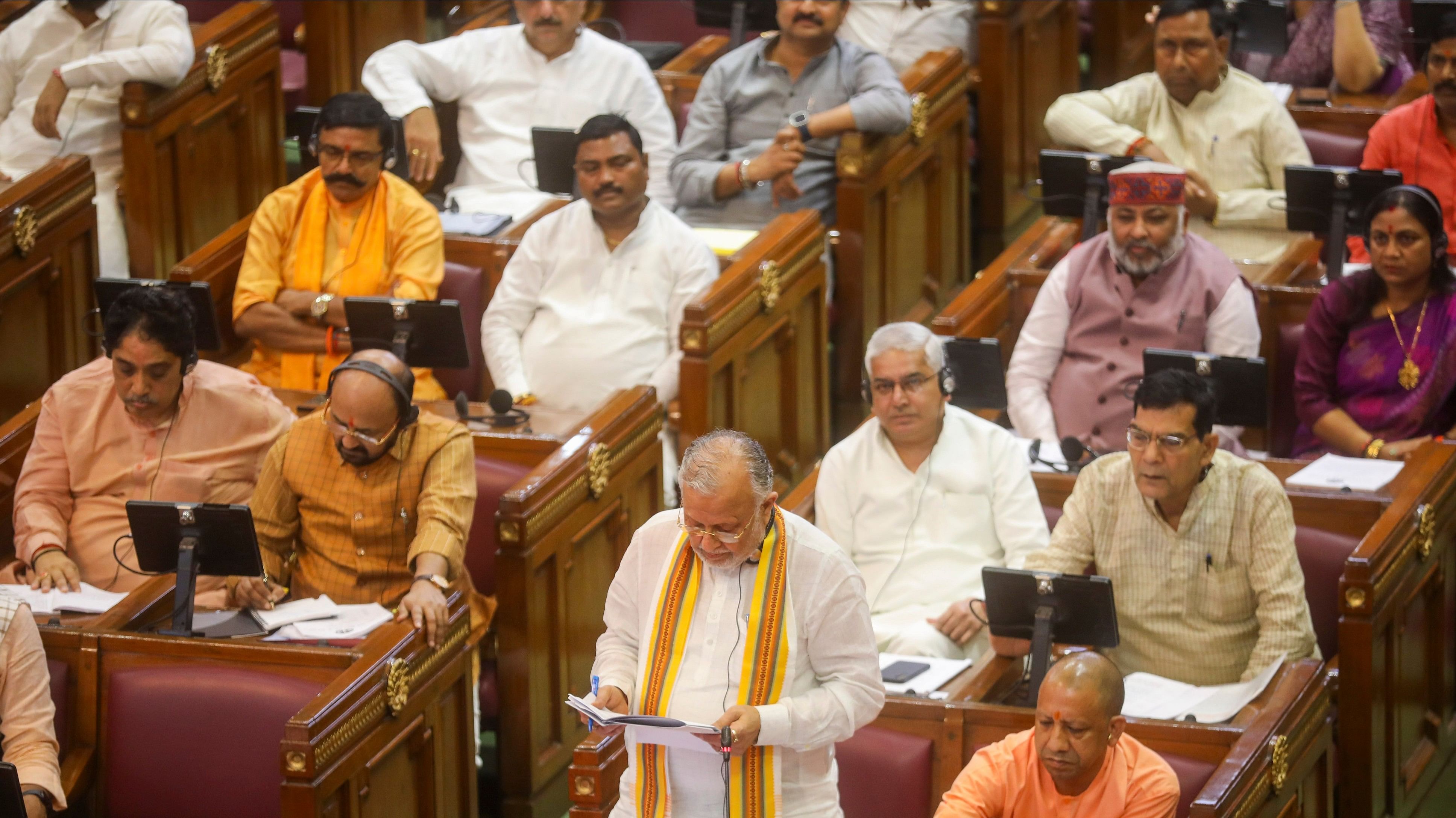 <div class="paragraphs"><p>Uttar Pradesh Finance Minister Suresh Khanna presents a supplementary budget in the presence of Chief Minister Yogi Adityanath and other members during the Monsoon session of state Legislative Assembly at Vidhan Bhawan, in Lucknow, Tuesday, July 30, 2024.</p></div>