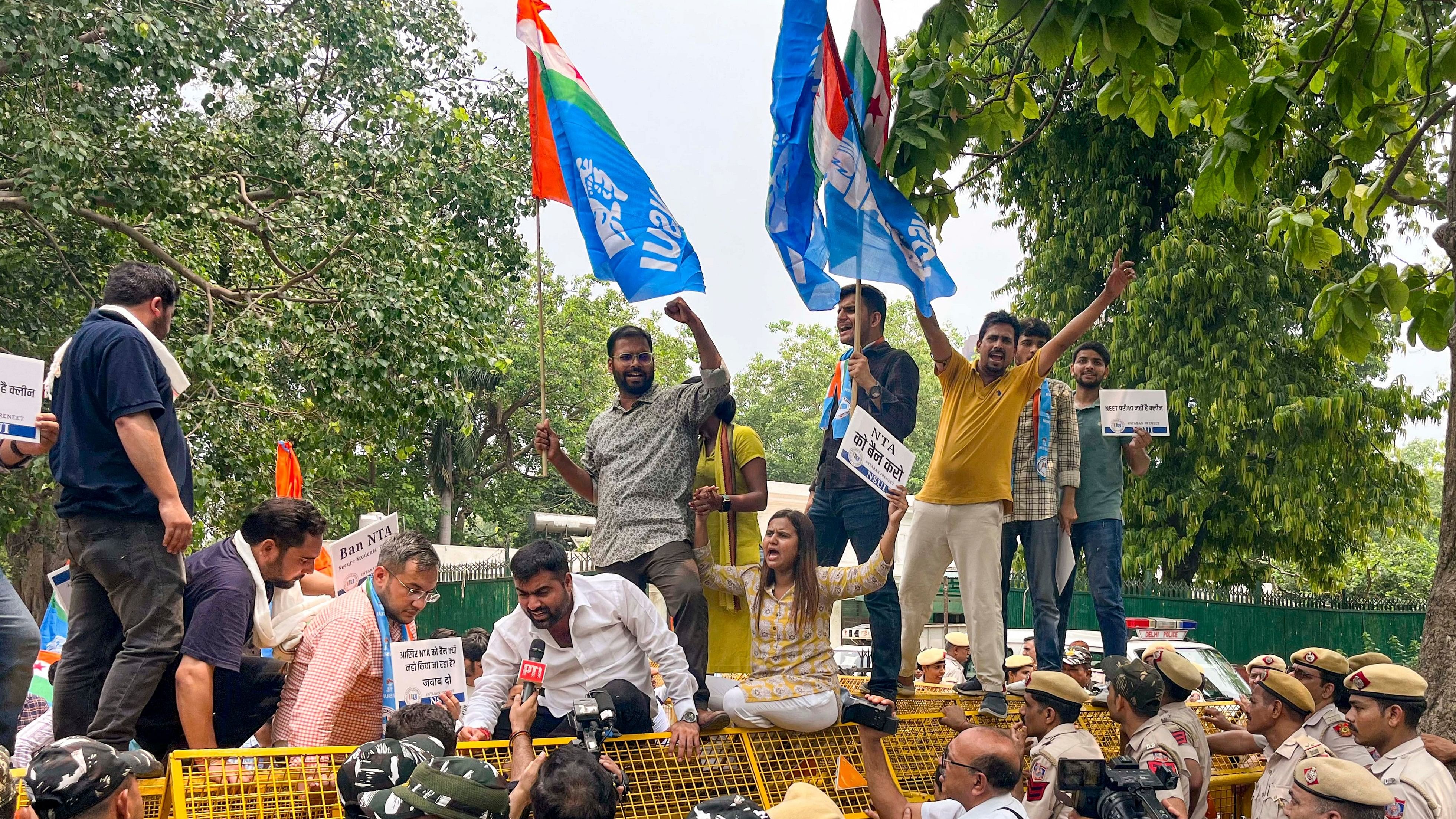 <div class="paragraphs"><p> NSUI activists stage a protest demanding re-conduct of the NEET exam, in New Delhi, Tuesday, July 23, 2024. </p></div>