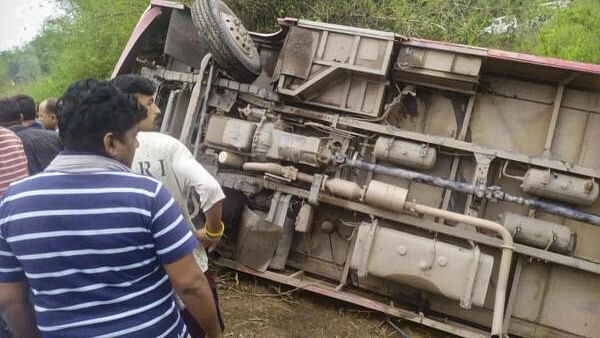 <div class="paragraphs"><p>Locals gather after a bus overturned, leaving some school students injured, at Pinjore in Panchkula district</p></div>