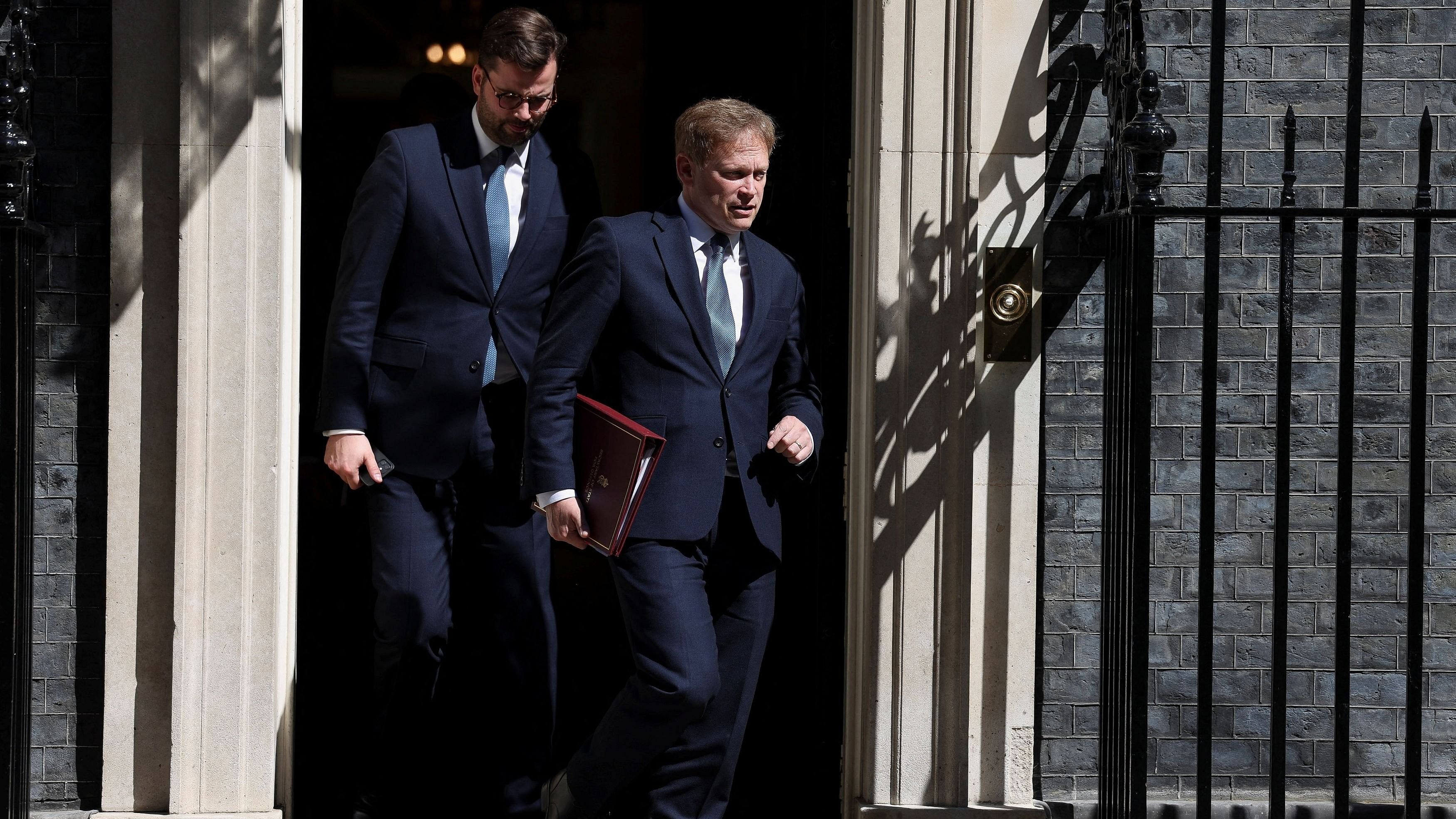 <div class="paragraphs"><p>British Secretary of State for Defence Grant Shapps walks after attending the weekly cabinet meeting.</p></div>