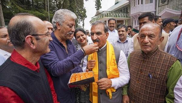 <div class="paragraphs"><p>Himachal Pradesh Chief Minister Sukhvinder Singh Sukhu being greeted after party won Assembly by-election, in Shimla, Saturday, July 13, 2024.</p></div>