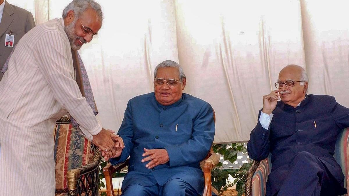 <div class="paragraphs"><p>File photo of former PM  Atal Bihari Vajpayee is seen with the then Gujarat CM Narendra Modi and BJP senior leader LK Advani</p></div>