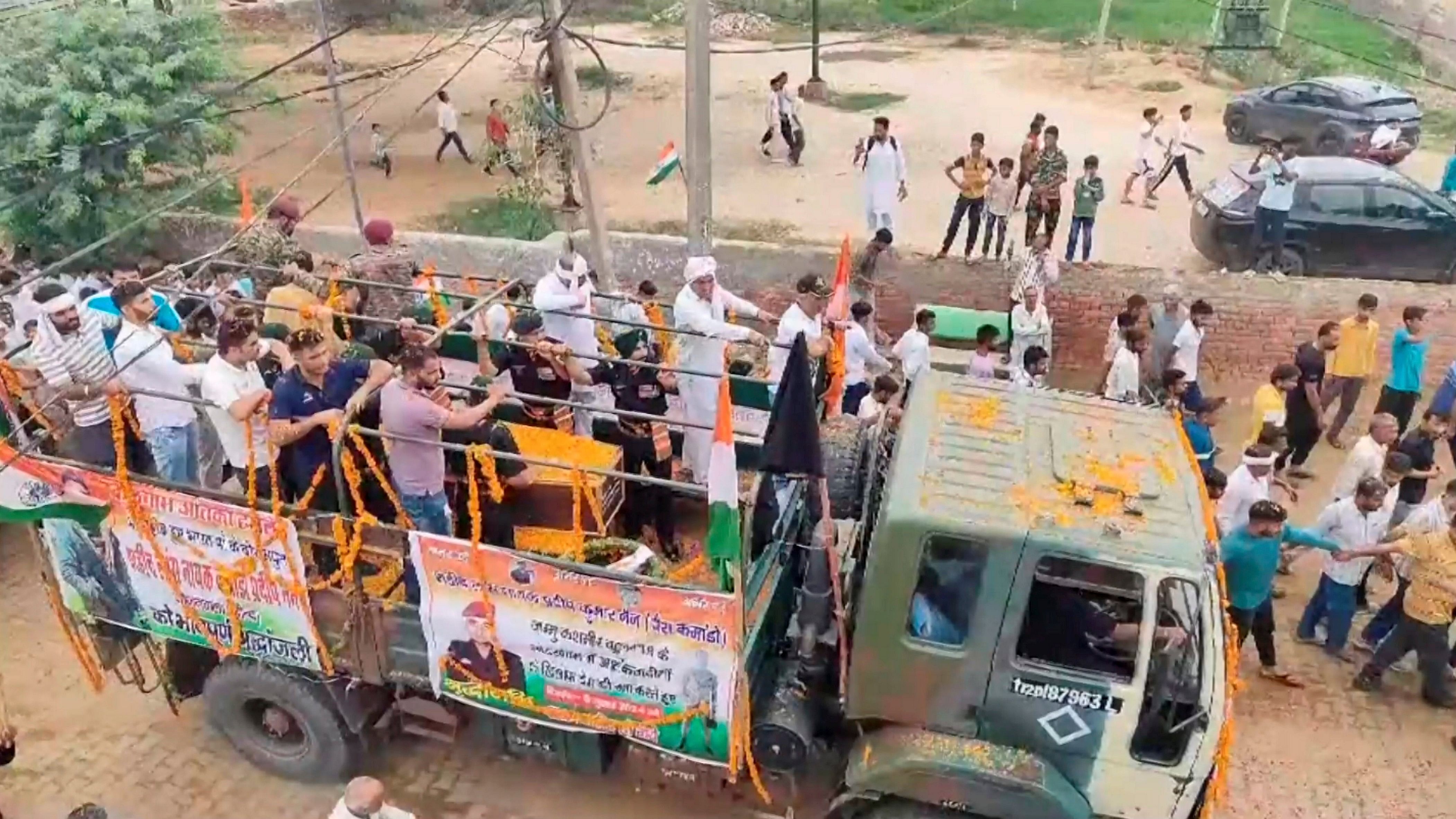 <div class="paragraphs"><p>Mortal remains of Lance Naik Pradeep Nain being brought to his native village, in Jind, Haryana, Monday, July 8, 2024. </p></div>