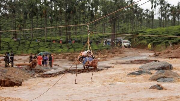 <div class="paragraphs"><p>An injured being shifted using ropeway as rescue operation is underway after landslides triggered by heavy monsoon rains, at Chooralmala in Wayanad dristrict,</p></div>