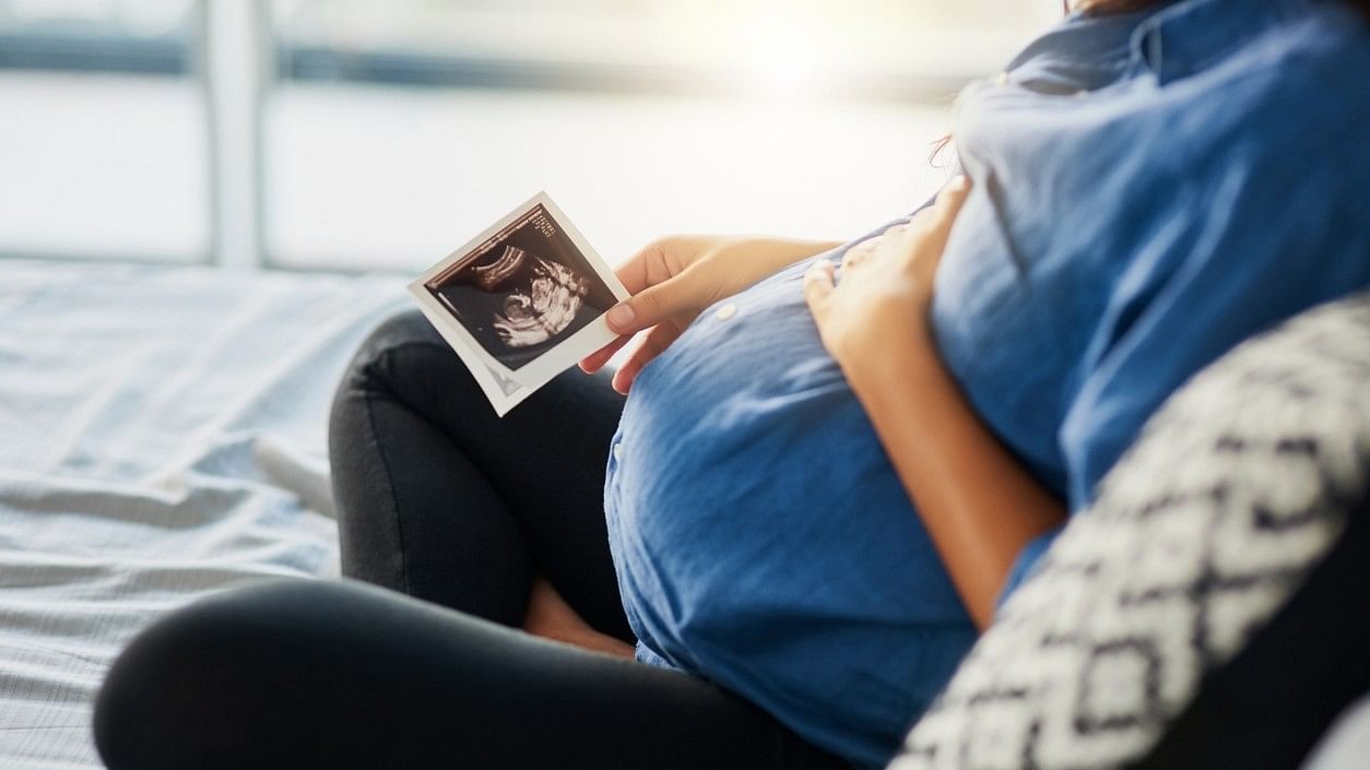 <div class="paragraphs"><p>An image showing a pregnant woman holding a photo showing a foetal ultrasound. For representational purposes.</p></div>