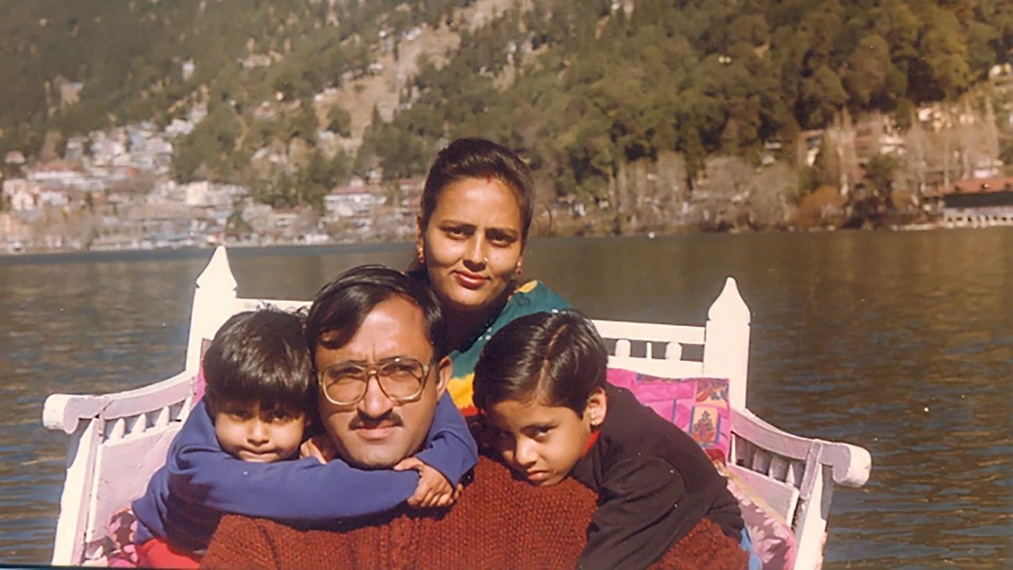 Maj C B Dwivedi with a young Diksha (left) and Neha, and his wife Bhawna on a vacation.