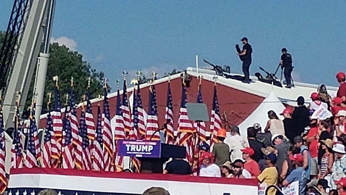 <div class="paragraphs"><p>snipers stand on a roof at Republican presidential candidate and former US President Donald Trump's campaign rally in Butler, Pennsylvania, US,  JULY 13, 2024 in this picture obtained from social media.  </p></div>