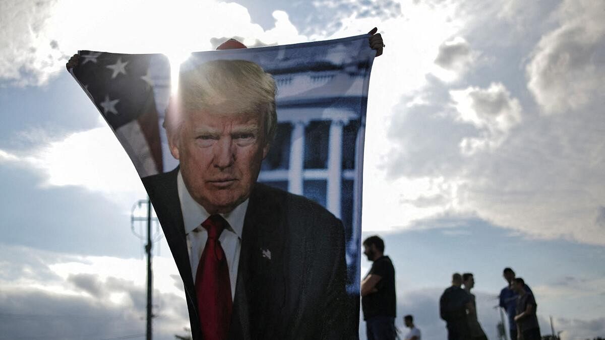 <div class="paragraphs"><p>Supporters of Republican presidential candidate and former U.S. President Donald Trump wait for his arrival in Milwaukee, Wisconsin, US</p></div>