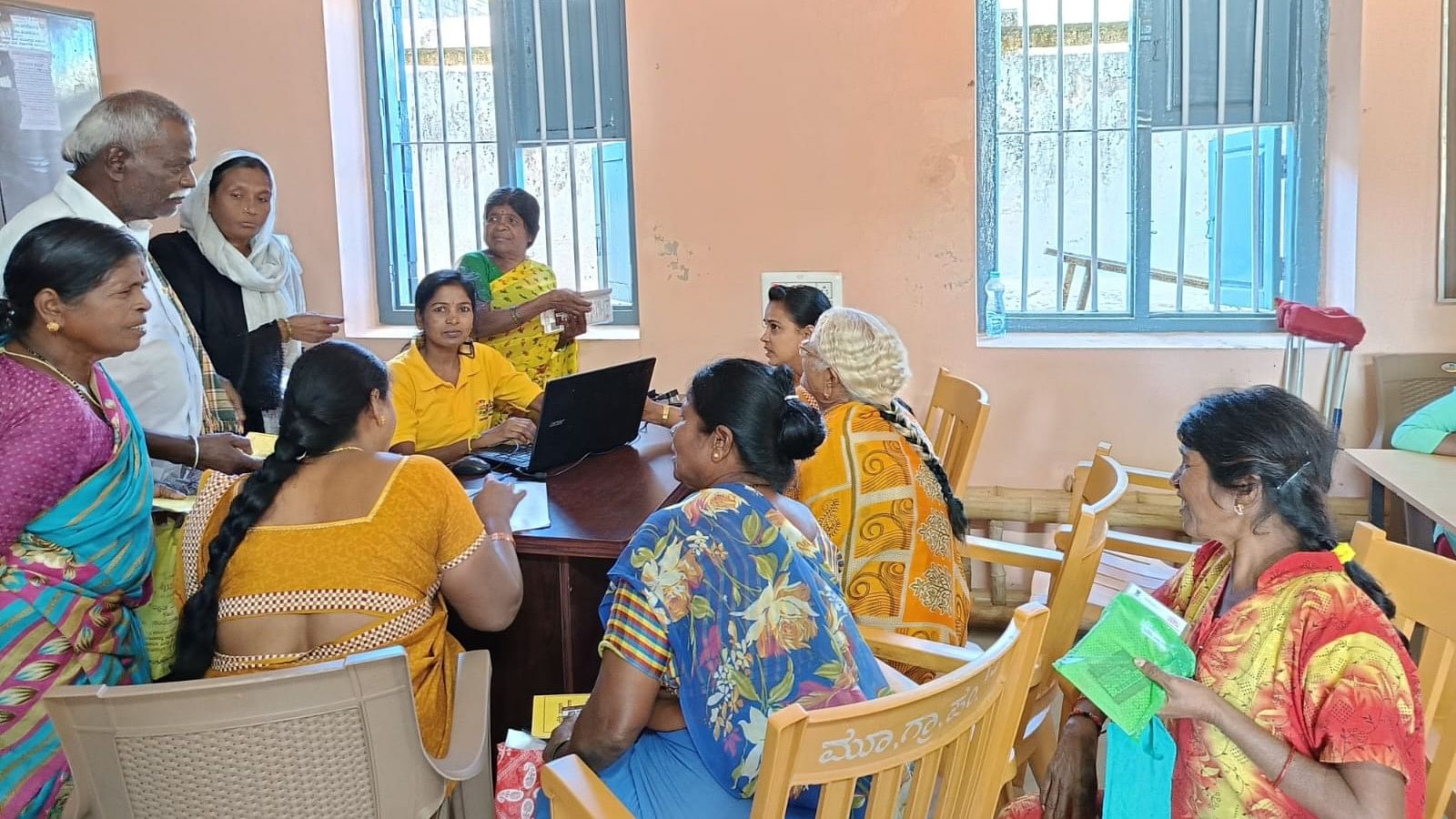 <div class="paragraphs"><p>Women at a Gram One Centre in Mysuru rural during a special drive to fix issues related to Gruhalakshmi scheme. </p></div>