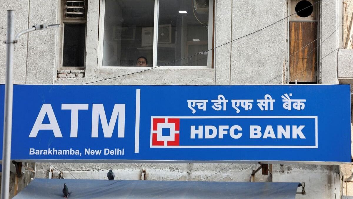 <div class="paragraphs"><p>The signboard of HDFC Bank's automated teller machine (ATM) in New Delhi, India.</p></div>