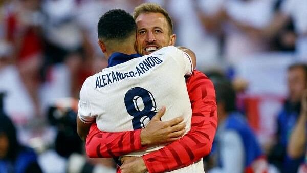 <div class="paragraphs"><p>Euro 2024 Quarter Final: England v Switzerland - Dusseldorf Arena, Dusseldorf, Germany - England's Trent Alexander-Arnold celebrates with teammate Harry Kane after scoring  during the penalty shootout to win the match.</p></div>