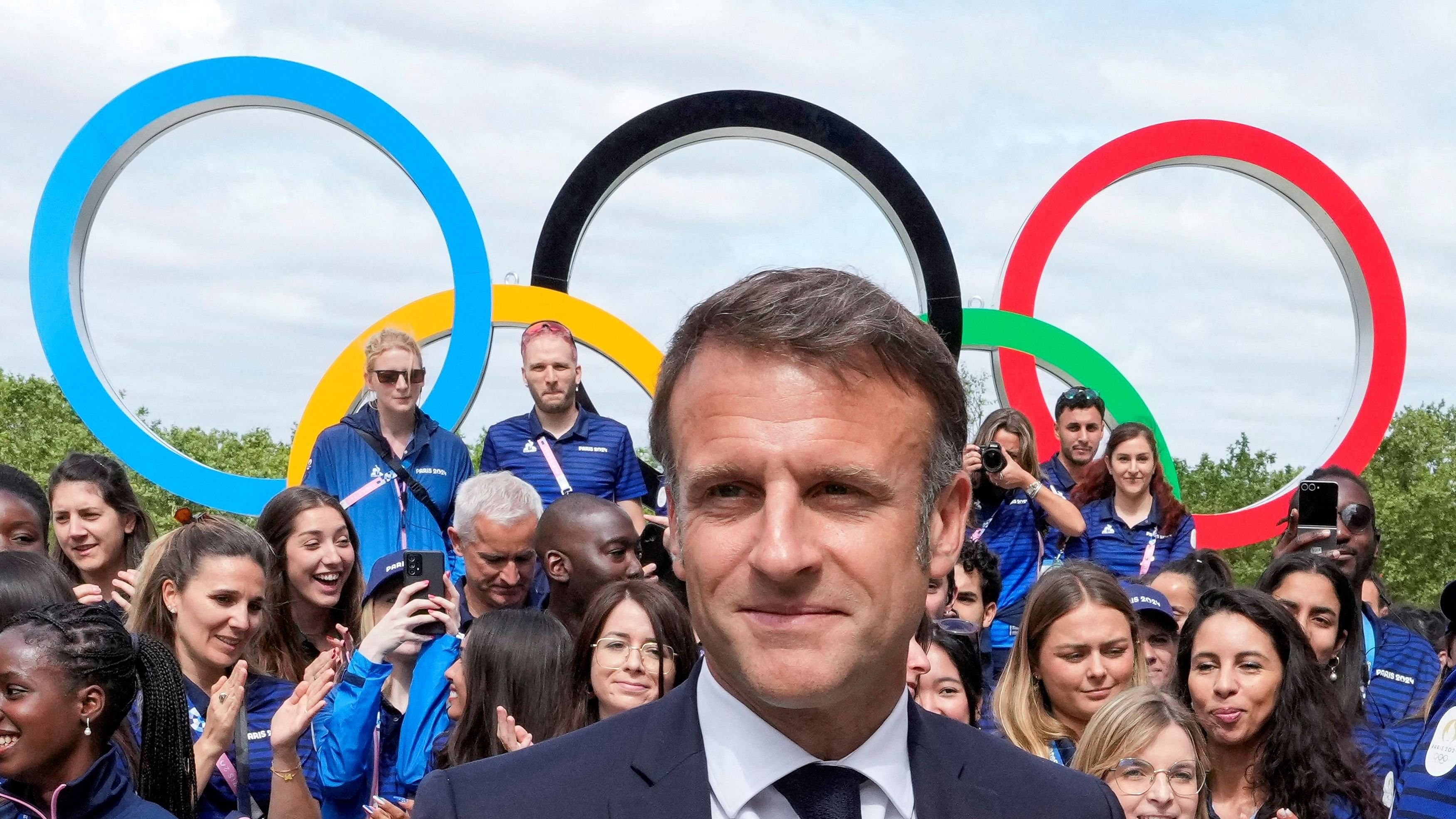 <div class="paragraphs"><p>French President Emmanuel Macron meets with French athletes as he visits the Olympic village.</p></div>