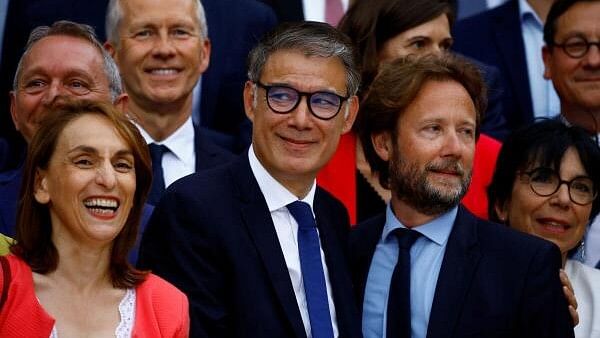 <div class="paragraphs"><p>Members of Parliament Fatiha Keloua-Hachi, Olivier Faure, and Boris Vallaud, of the French Socialist Party (PS), and the left-wing parties alliance named "Nouveau Front Populaire" (New Popular Front - NFP), pose for a family photo.</p></div>