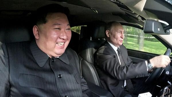 <div class="paragraphs"><p>Russia's President Vladimir Putin and North Korea's leader Kim Jong Un ride an Aurus car in Pyongyang, North Korea in this image released by the Korean Central News Agency.</p></div>