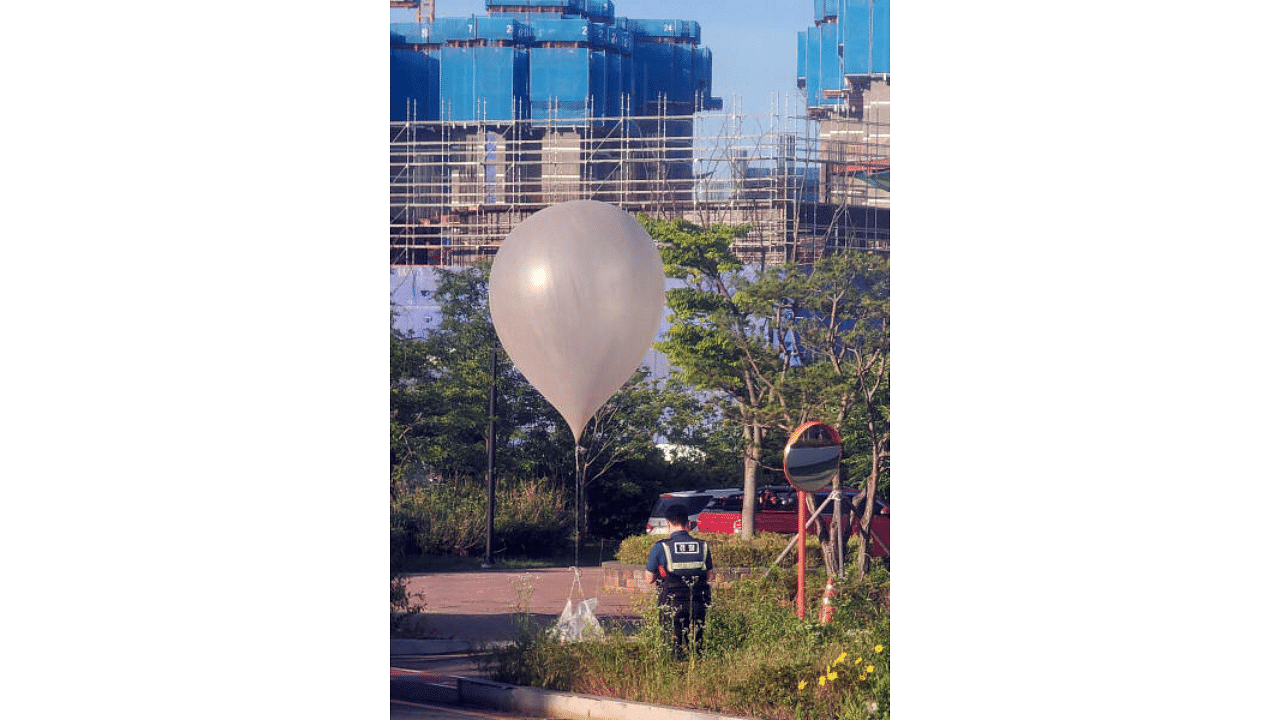 <div class="paragraphs"><p>A balloon believed to have been sent by North Korea, carrying various objects including what appeared to be trash, is pictured at a park in Incheon, South Korea.</p></div>