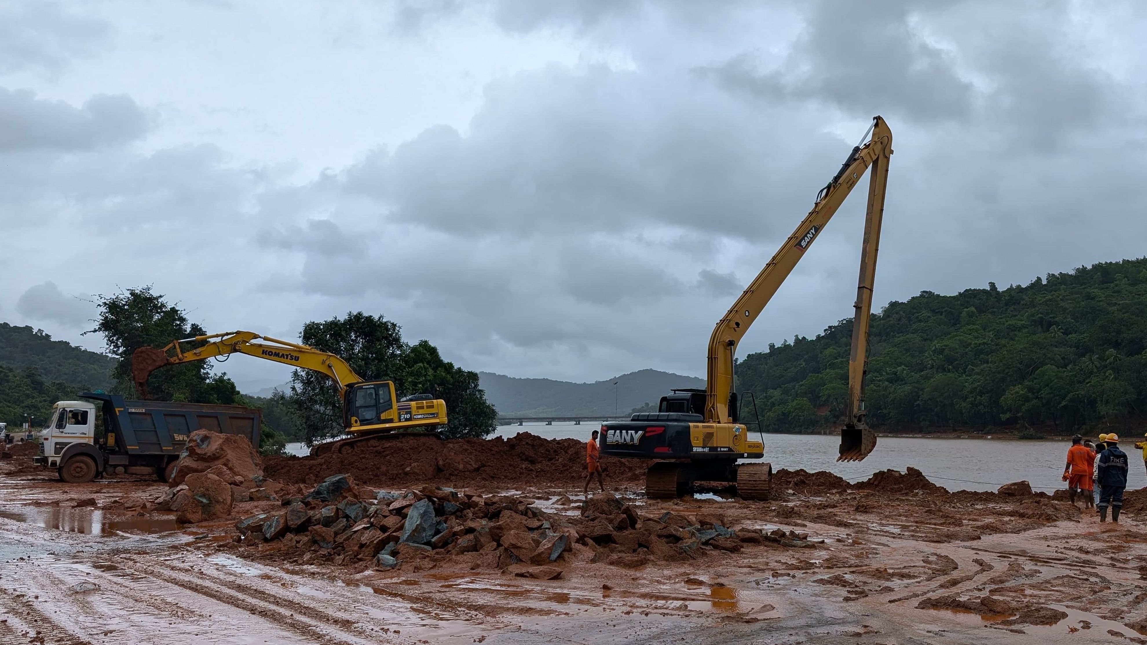 Excavators at the site of the landslide in Shirur, Uttara Kannada district.
