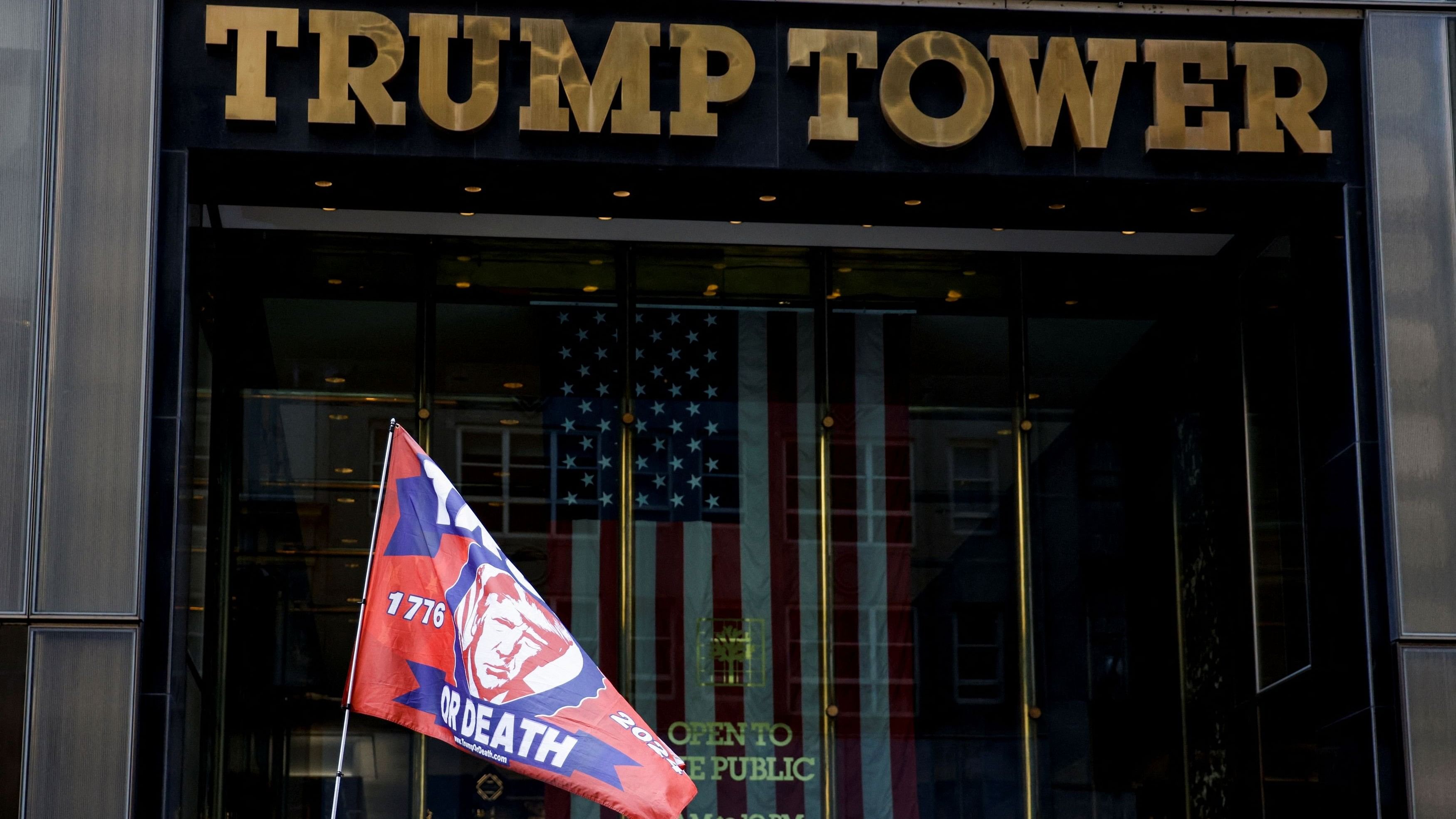 <div class="paragraphs"><p>A flag in support of Republican presidential candidate and former US President Donald Trump flutters outside Trump Tower, after Trump was injured when shots were fired during a campaign rally held in Butler, Pennsylvania, in New York, U.S., July 14, 2024. </p></div>