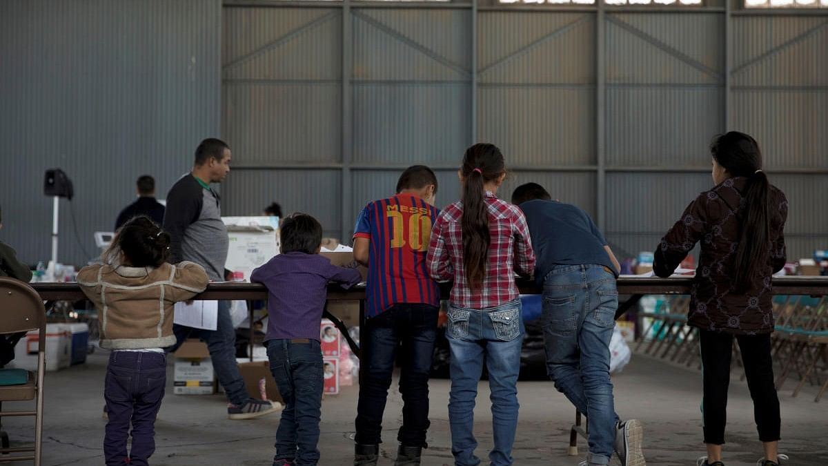 <div class="paragraphs"><p>File Photo: Migrant children stand at a shelter and processing center in Deming, New Mexico, US.</p></div>