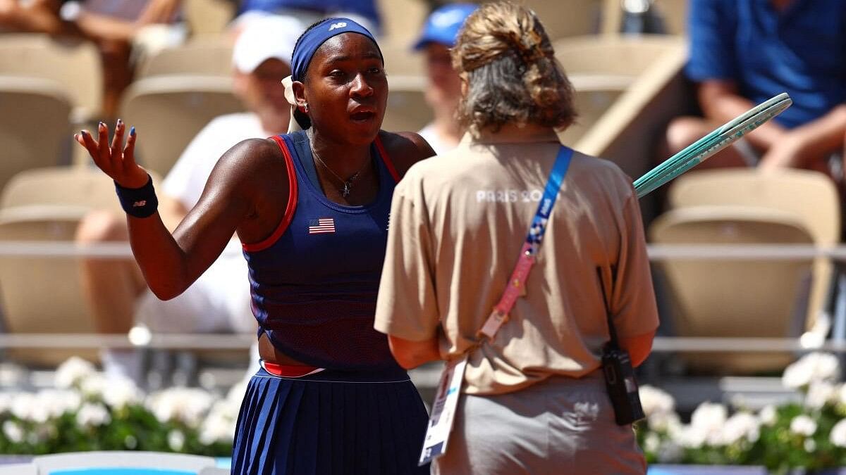 <div class="paragraphs"><p>Coco Gauff of United States talks with an official during her match against Donna Vekic of Croatia.</p></div>