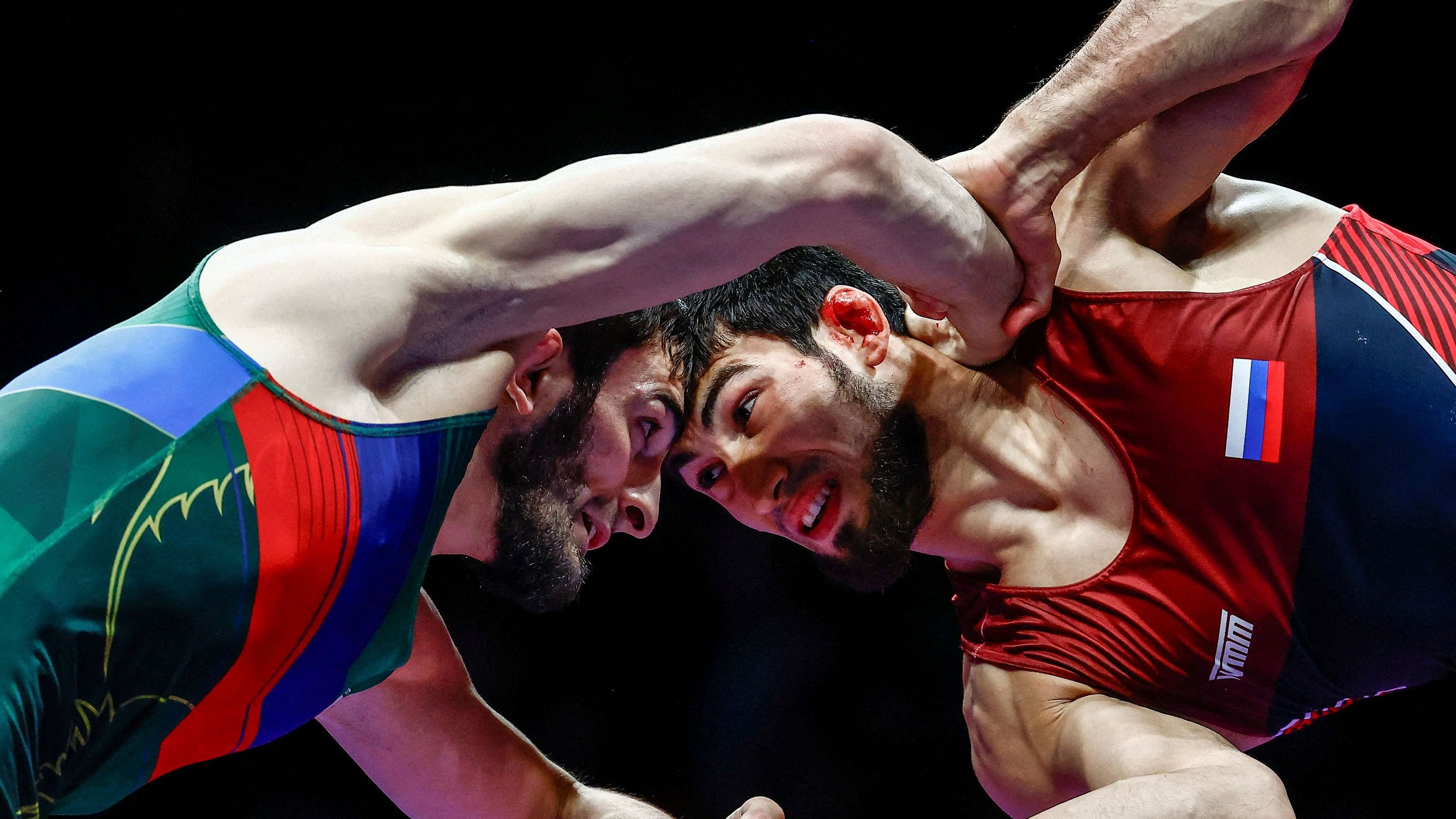 <div class="paragraphs"><p>Russian wrestlers set on competing in Paris Olympics despite bans on team mates</p></div>