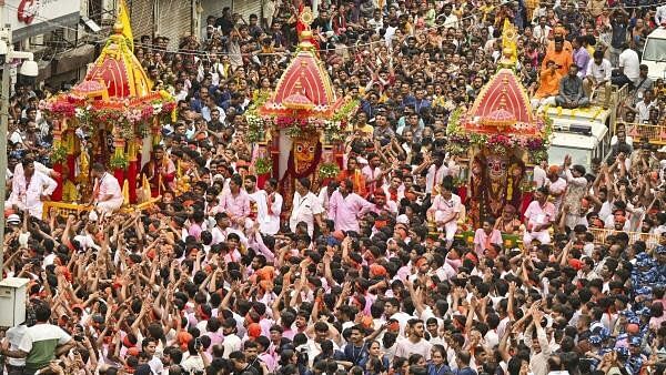 <div class="paragraphs"><p>Devotees take part in the annual Rath Yatra, in Ahmedabad, Sunday, July 7, 2024. </p></div>