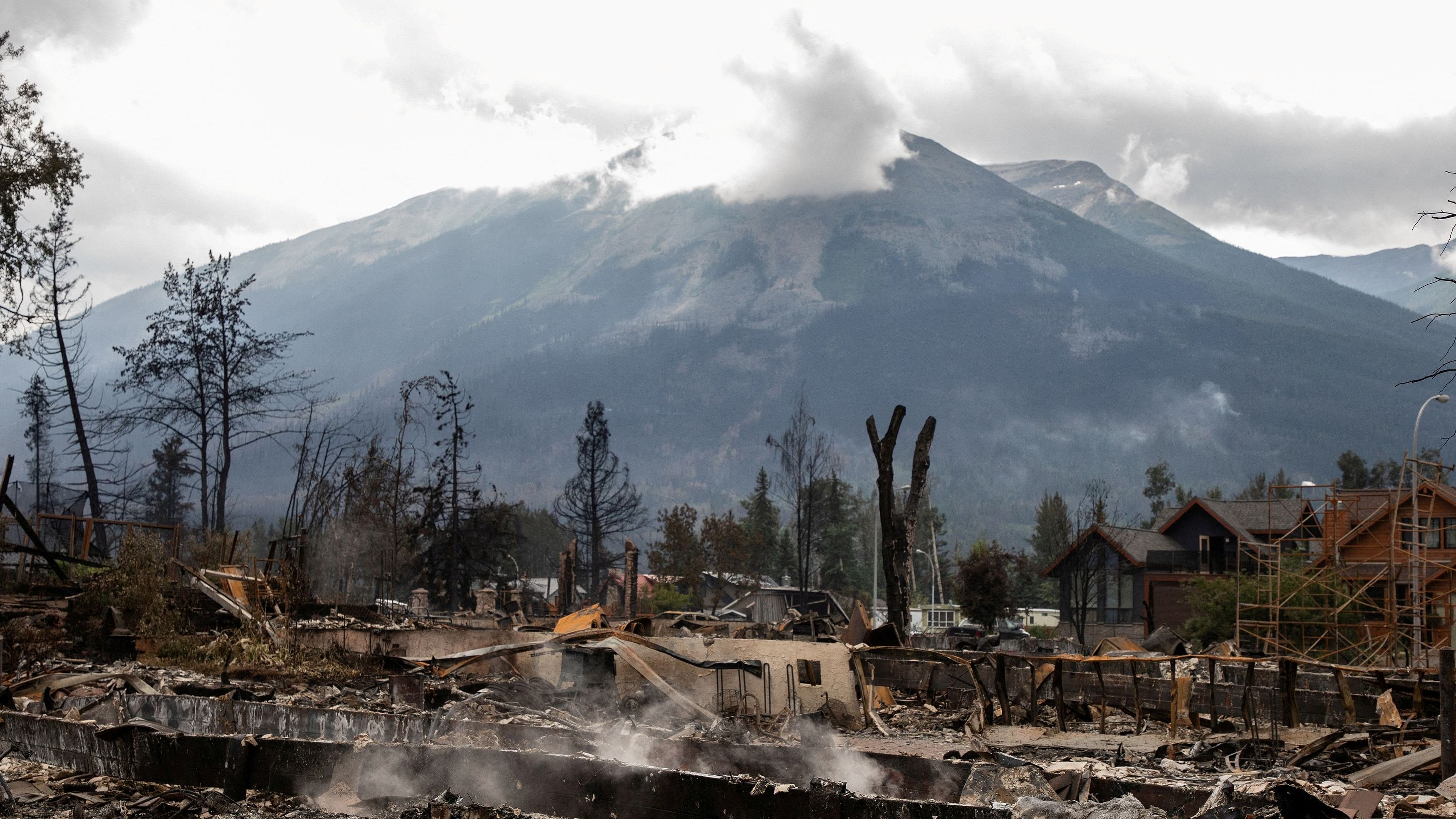 <div class="paragraphs"><p>A devastated residential block in Jasper, Alta., Canada is shown during a tour on Friday, July 26, 2024.</p></div>