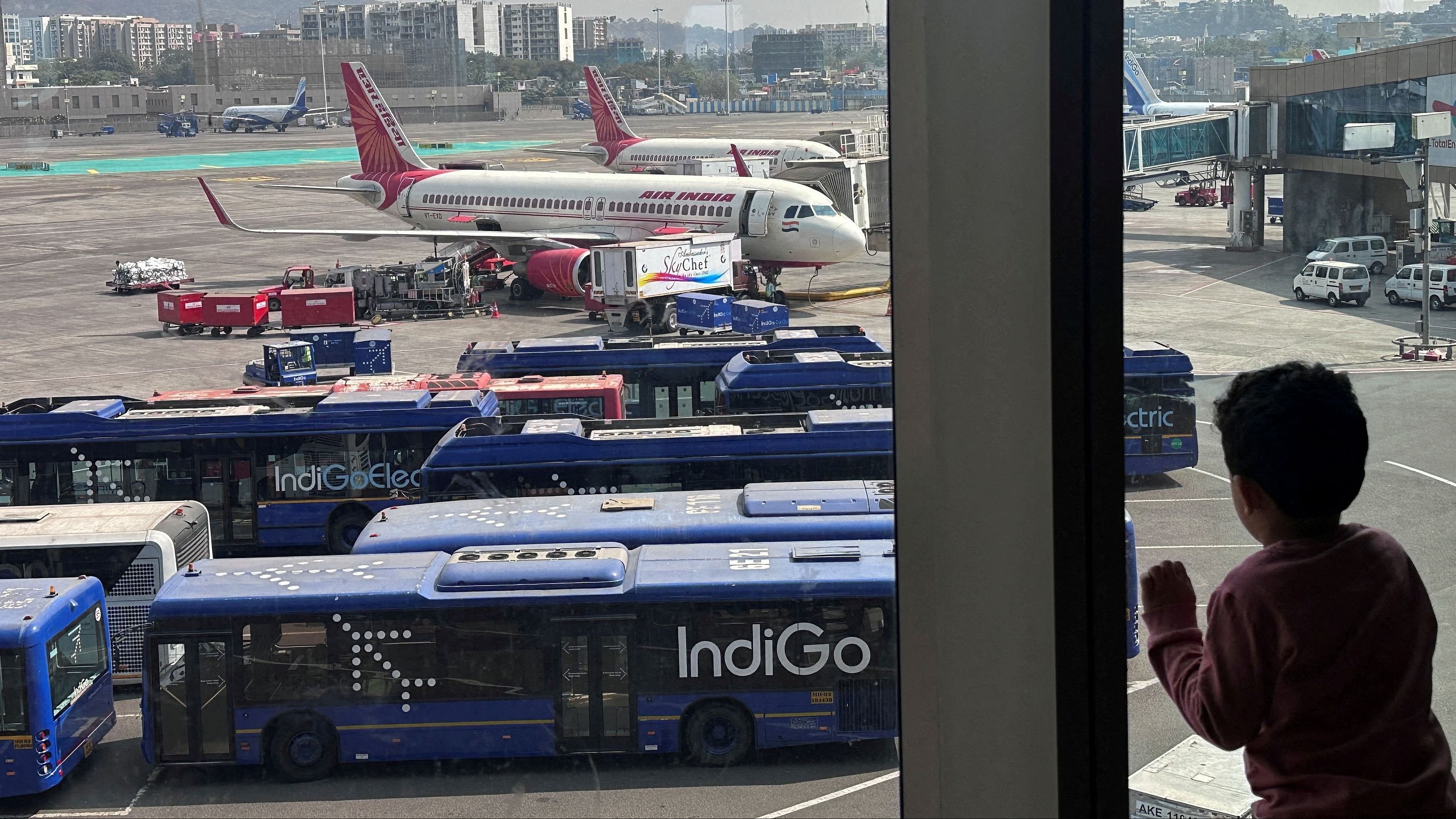 <div class="paragraphs"><p>Aircrafts parked at the Chhatrapati Shivaji Maharaj International Airport in Mumbai, India.</p></div>