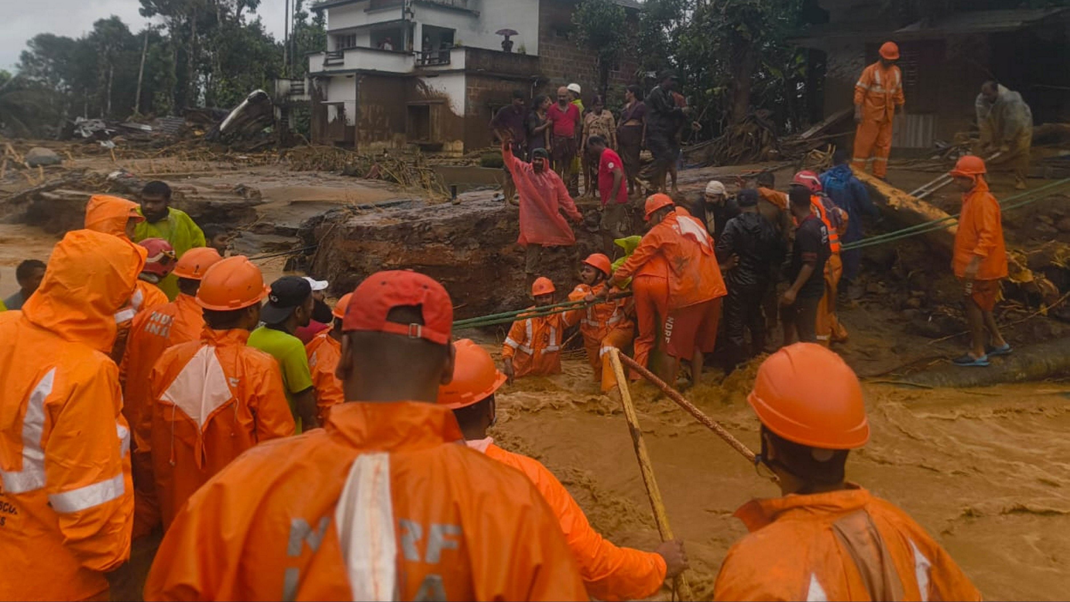 <div class="paragraphs"><p>National Disaster Response Force (NDRF) personnel conduct rescue operation after huge landslides in the hilly areas near Meppadi, in Wayanad district, Kerala.</p></div>