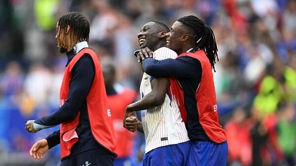 <div class="paragraphs"><p>Euro 2024: France's Randal Kolo Muani and Eduardo Camavinga celebrate win after the France v Belgium match in Dusseldorf Arena, Dusseldorf, Germany</p></div>