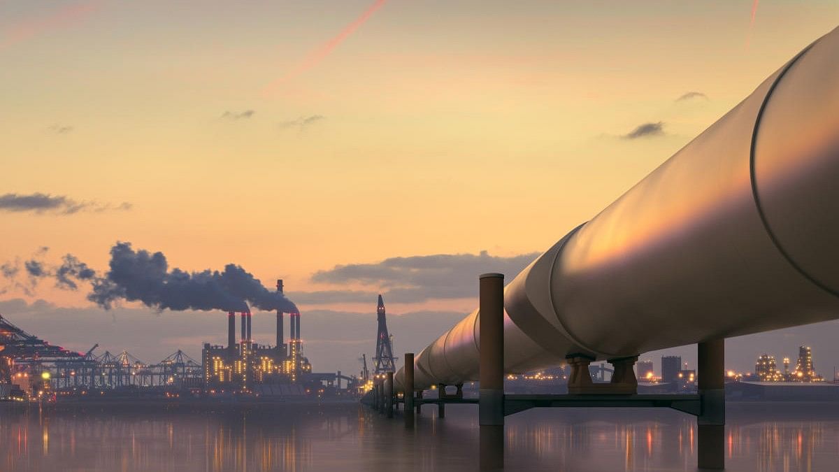 <div class="paragraphs"><p>Oil pipeline in industrial district with factories at dusk.</p></div>