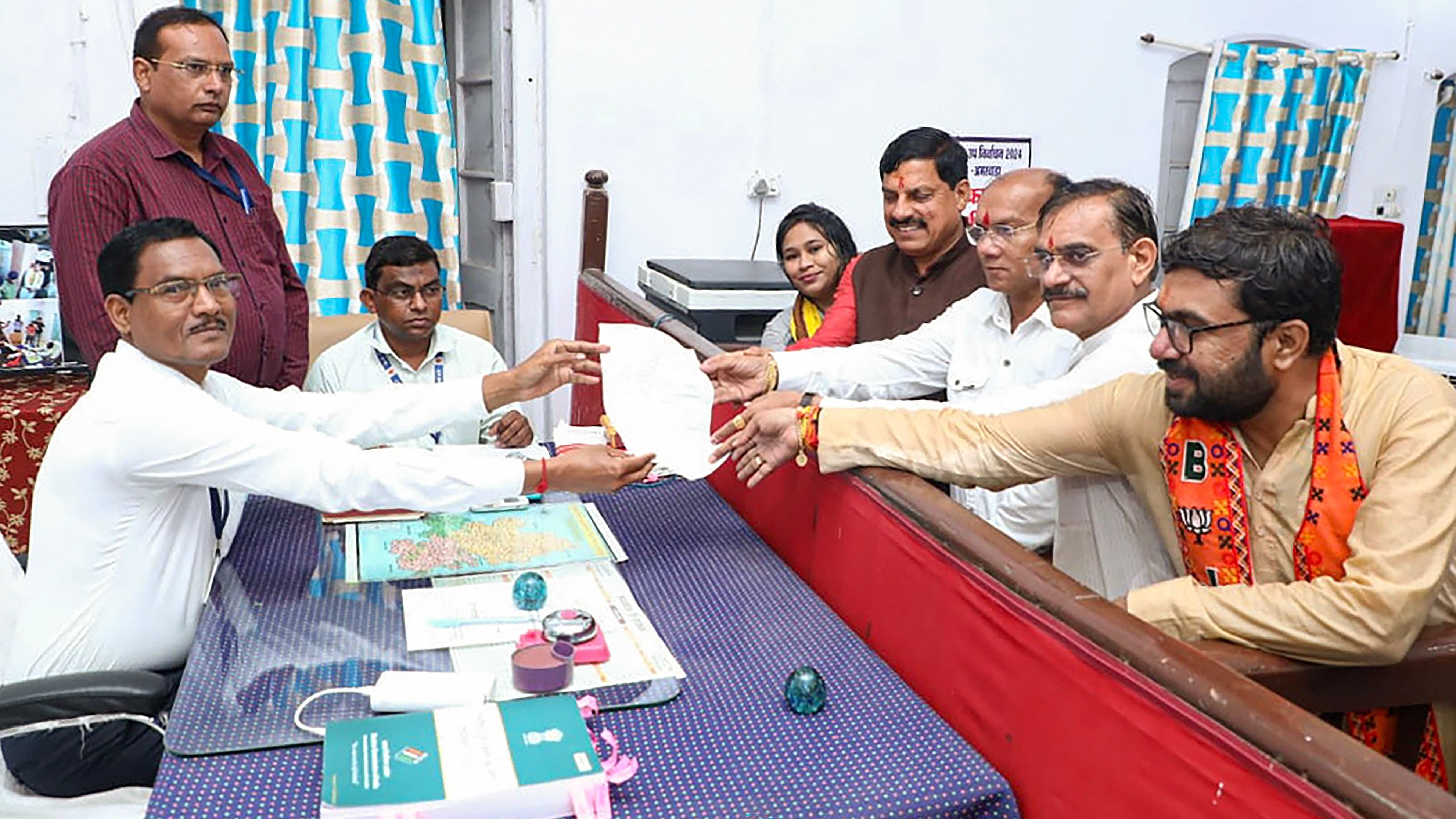 <div class="paragraphs"><p>Chhindwara: BJP candidate Kamlesh Shah files his nomination papers in the presence of Madhya Pradesh Chief Minister Mohan Yadav for the bypoll from Amarwara Assembly constituency, in Amarwara of Chhindwara district, Madhya Pradesh. </p></div>