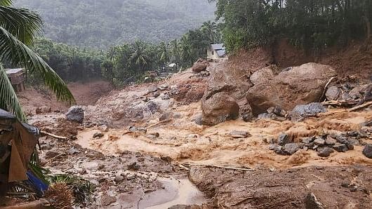 <div class="paragraphs"><p>Landslides in the hilly areas near Meppadi, in Wayanad district, Kerala, Tuesday, July 30, 2024.</p></div>