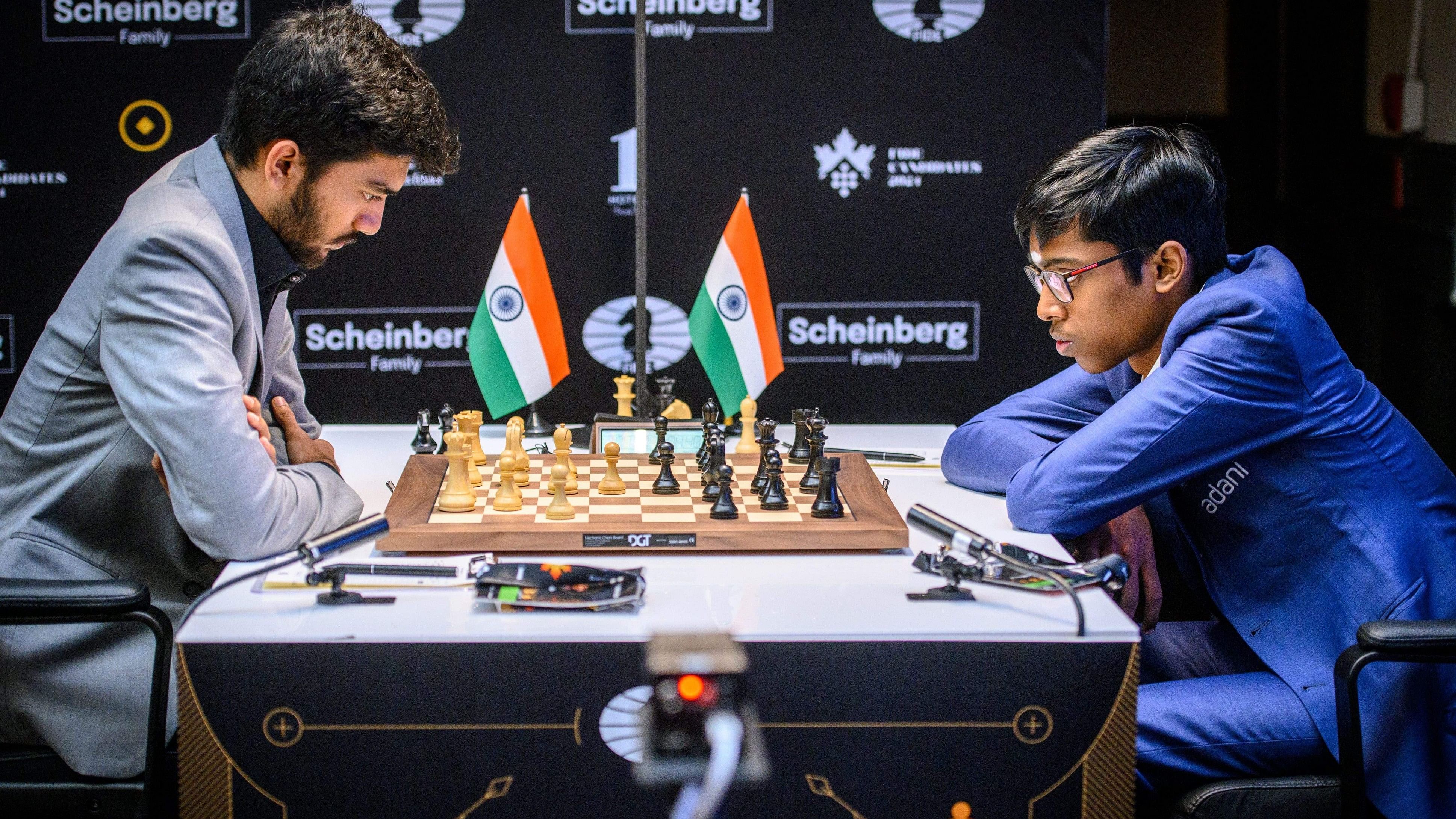 <div class="paragraphs"><p>Toronto: Indian GM D Gukesh (L) and compatriot GM R Praggnanandhaa during their round 9 match at the FIDE Candidates 2024 chess tournament, in Toronto, Canada, Sunday, April 14, 2024.</p></div>