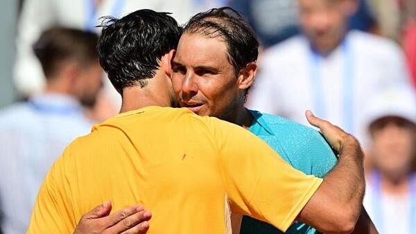 <div class="paragraphs"><p>Portugal's Nuno Borges embraces Spain's Rafael Nadal after winning his men's singles final Bjorn</p></div>