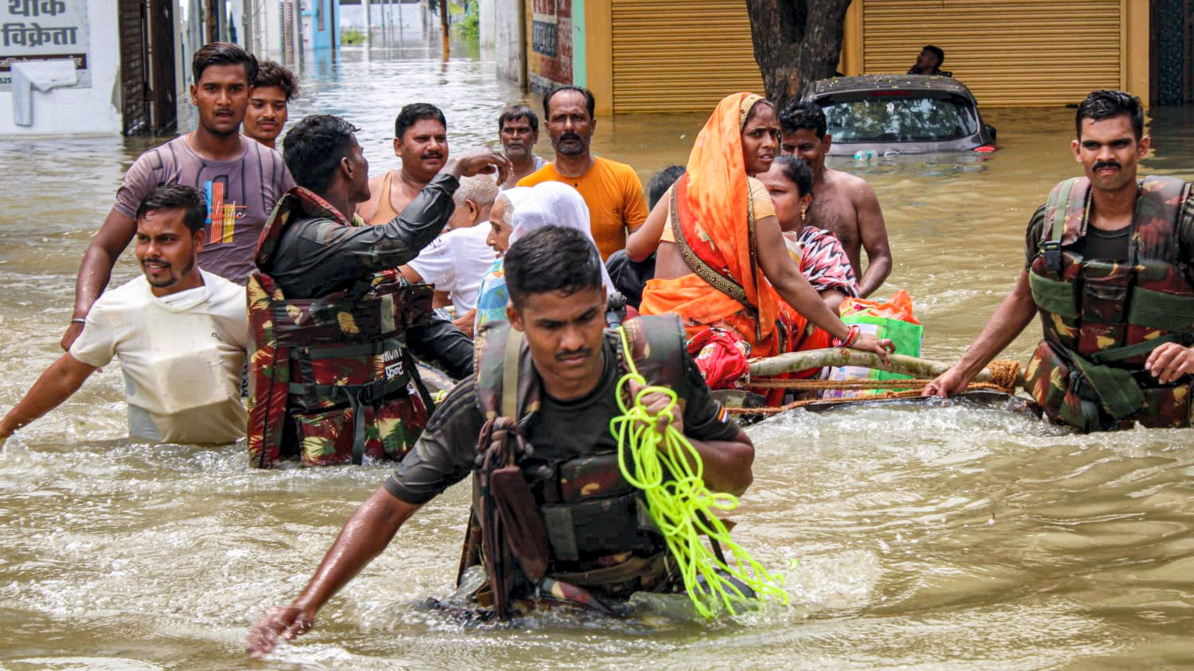 <div class="paragraphs"><p>Army personnel during a rescue and relief operation following rising water levels in the Garra and Khannaut Rivers, in Shahjahanpur.</p></div>