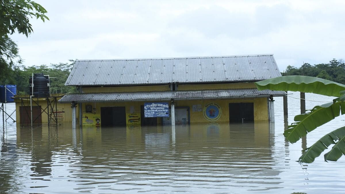 <div class="paragraphs"><p>View of a flooded area after heavy rainfall, in Sivasagar, Assam</p></div>